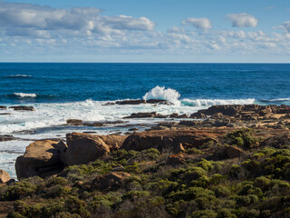 waves crashing on rocks
