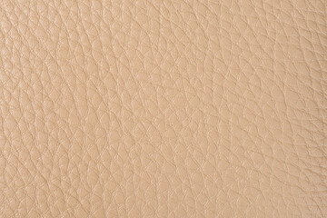 Natural brown or beige leather texture background.