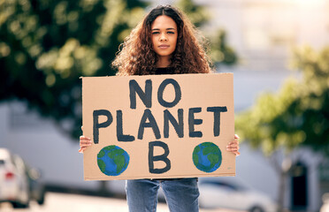 Woman, poster and portrait in street for planet, climate change and sustainable future in city....