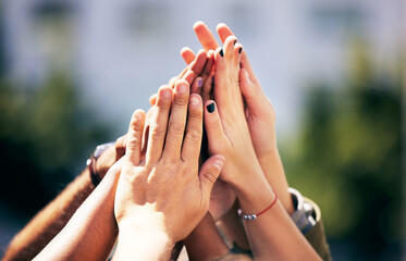 Community, together and hands for success high five, motivation or goals as a group of friends....