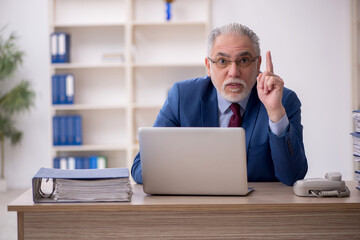 Old male employee and too much work at workplace