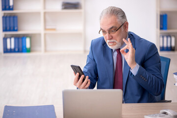 Old male employee and too much work at workplace