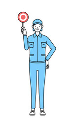 正解を示すマルの棒を持つ帽子と作業着姿のシニア女性（経営者、管理職、上司）