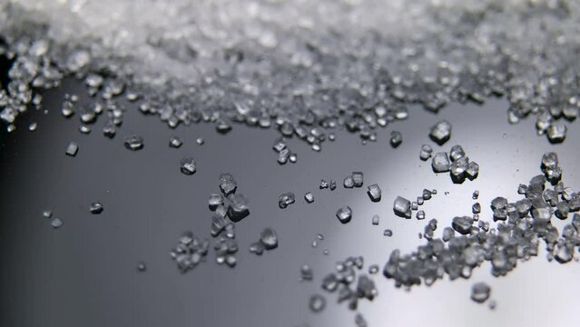 Close up shot of Sugar Crystals on a metal surface