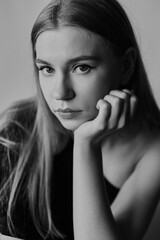 Black and white portrait of a young woman with natural makeup and natural styling.Advertising natural cosmetics.Advertising for a beauty salon. High quality photo