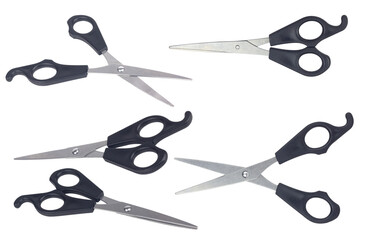 set scissors, hairdressing scissors with plastic black handles isolated from background