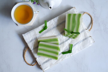 kue lapis and cup of tea