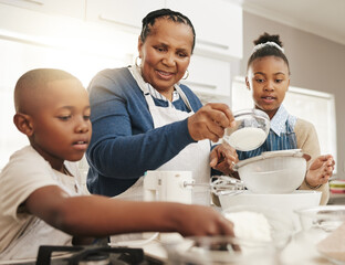 Black family, grandmother teaching kids baking and learning cooking skill in kitchen with help and support. Old woman with girl and boy, development with growth and bake with ingredients at home
