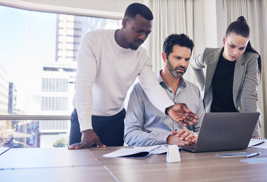 Group, business people and laptop in office for discussion, planning and strategy for finance, project and diversity. Men, woman and computer in workplace with teamwork, problem solving and solution