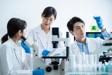 Scientists discussing progress in the laboratory