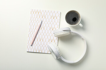 Concept of freelance, composition with hot drink and headphones