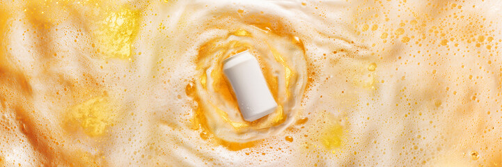 Can bottle of cool lager beer diving into foamy beer splashes. Chill drink, refreshment. Drink aesthetics. Banner. Concept of alcohol drink, taste, vacation, holiday, brewery. Advertisement