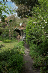 Fototapeta na wymiar Gardenhouse in garden. Park. Summer. Netherlands