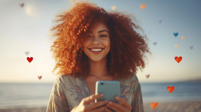 woman with curly red afro hair, texting, at the beach, hearts floating around, smiling looking at camera, summertime. Generative Ai image