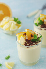 Orange lemon citrus milk mousse in glasses