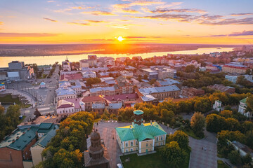 Obraz premium Panorama city Tomsk and Tom River with sunlight. Aerial top view