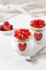 Strawberry chia pudding with whipped cream.