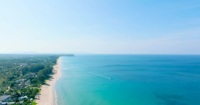 Aerial view tropical beach sea in sunny sky Fishing briged blue sea and blue sky background