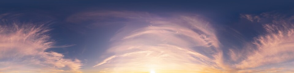 Sunset sky panorama with golden pink Cirrus clouds. Seamless hdr spherical 360 panorama. Sky dome in 3D visualization, sky replacement for aerial drone 360 panoramas. Weather and climate change