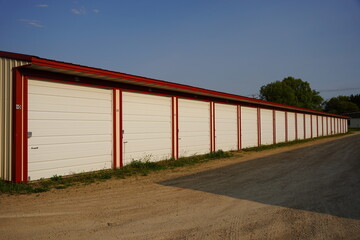 Obraz premium Red and Tan storage units holding the owner's property.