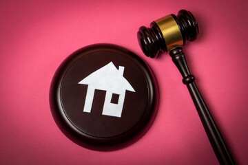 Bankruptcy, insolvency and legal protection concept. Court gavel on pink background
