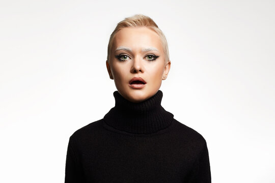 portrait of Short Hair Beautiful young woman. sensual girl with make-up and blond Hair