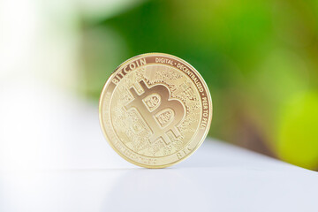 Bitcoin on defocused background.