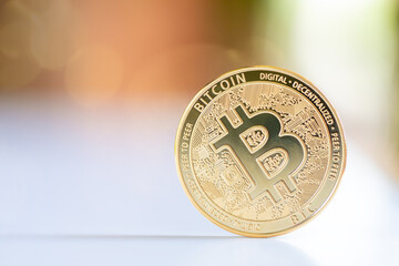 Bitcoin on defocused background.