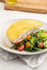 Portion of gourmet french airy poulard omelette breakfast