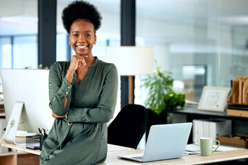 Portrait of confident black woman in modern office with smile, computer and African entrepreneur...