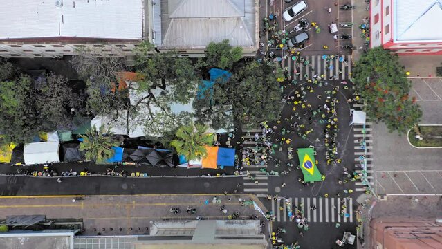 Drone view of supporters of the Brazilian ex president Jair Bolsonaro camping in front of the Army Head Quarters of Porto Alegre, Brazil, in protest not satisfied after Lula's presidential election.