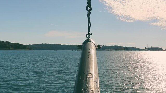 View Of The Water From The Bow Of The Ship. Bowsprit In The middle. Moving Forward In The Sea.