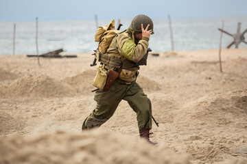 Historical reconstruction. An American infantry soldier from the World War II  fighting on the...