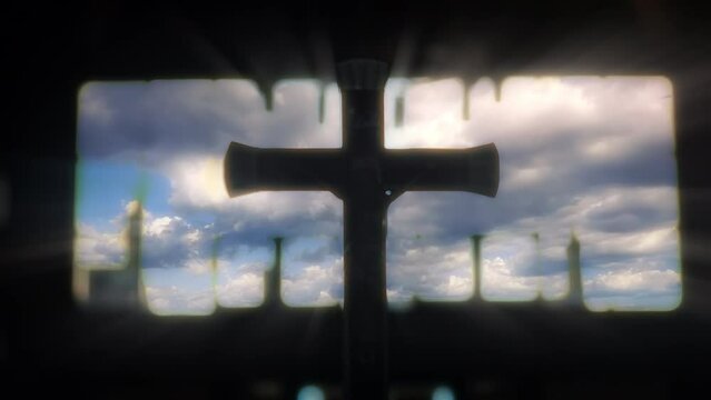 Crucifix Jesus Heavenly Sky Lights Flickering Zoom In. Crucifix of Jesus silhouette under a heavenly sky lights. Religious background