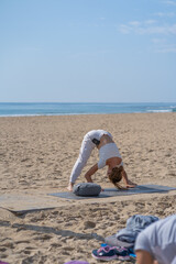 Fototapeta na wymiar outdoor yoga exercise with blue background