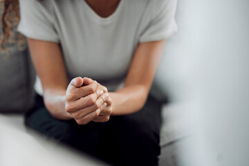 Hands, psychology and mental health with a woman in a therapy session for grief counseling after loss. Anxiety, stress or depression with a female patient feeling nervous in a clinic for support - obrazy, fototapety, plakaty
