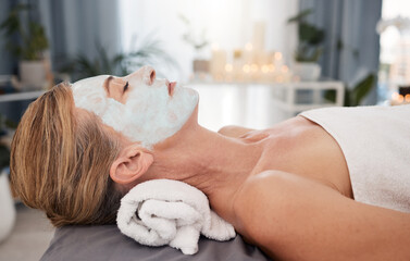 Woman, customer and mask with facial, spa and relax with skincare, natural beauty and dermatology. Female person, mature lady and client with cosmetics for face, wellness or luxury with peace or rest