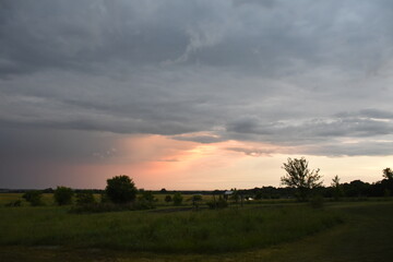 Sunrise Over a Farm Field