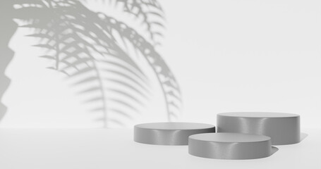 Three product podiums, blurry shadows of palm leaf silhouettes. 3d rendering