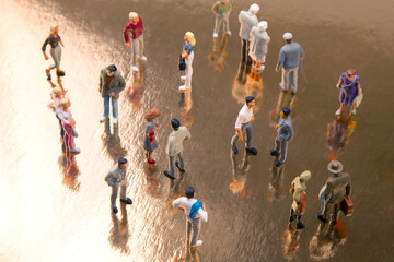 miniature people. different people communicate with each other. communication of society of different generations