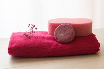 Towel, sponge and bath soap