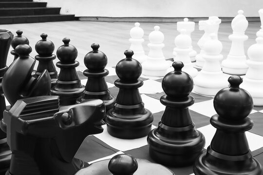 Business strategy competition concept imply by big scale of chess board game image in black and white.Image use for business strategy background.