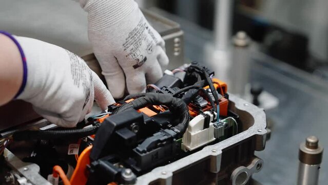 Close up of manufacturing car parts. Automobile industry. Car factory assembly line engineering 