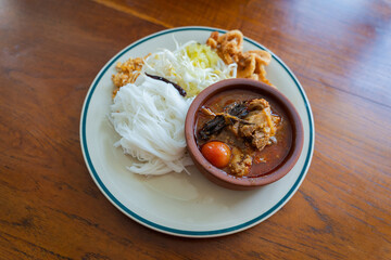Khao Soi Nam Ngiao or Nam Ngiao is a noodles soup or curry of the cuisine Northern Style Curried Noodle Soup with braised pork ribs is the favorite delicious food of Northern Thai cuisine.