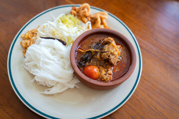 Khao Soi Nam Ngiao or Nam Ngiao is a noodles soup or curry of the cuisine Northern Style Curried Noodle Soup with braised pork ribs is the favorite delicious food of Northern Thai cuisine.