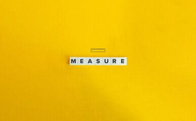 Measure Word and Concept Image. Letter Tiles on Yellow Background. Minimal Aesthetics. - obrazy, fototapety, plakaty