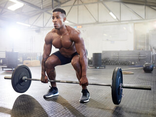Fitness, muscle and black man with a barbell, training and exercise with strength, wellness and...