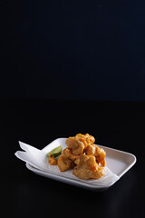 Chicken Karaage Japanese Fried chicken isolated in black background