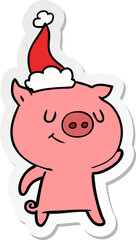 happy hand drawn sticker cartoon of a pig wearing santa hat