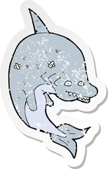 retro distressed sticker of a cartoon shark